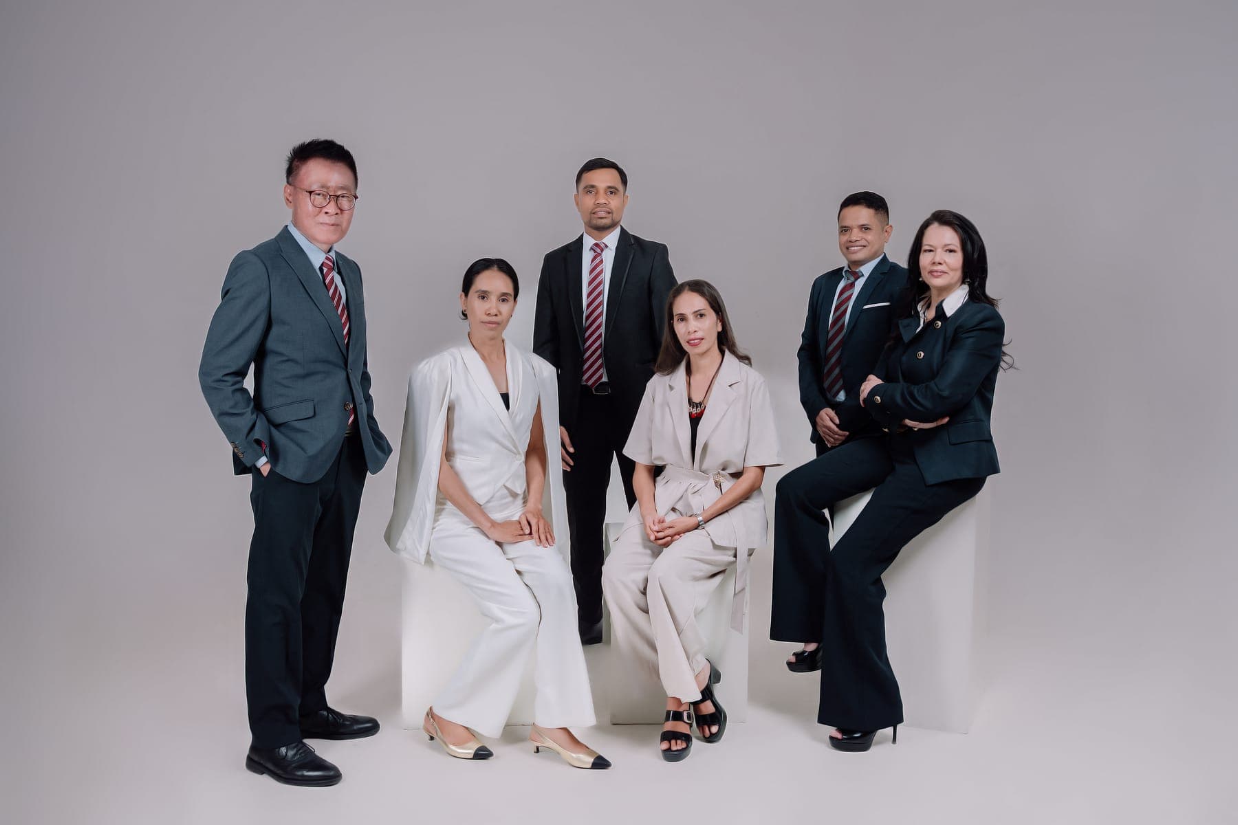 Studio group portrait of the Wong Alliance team
